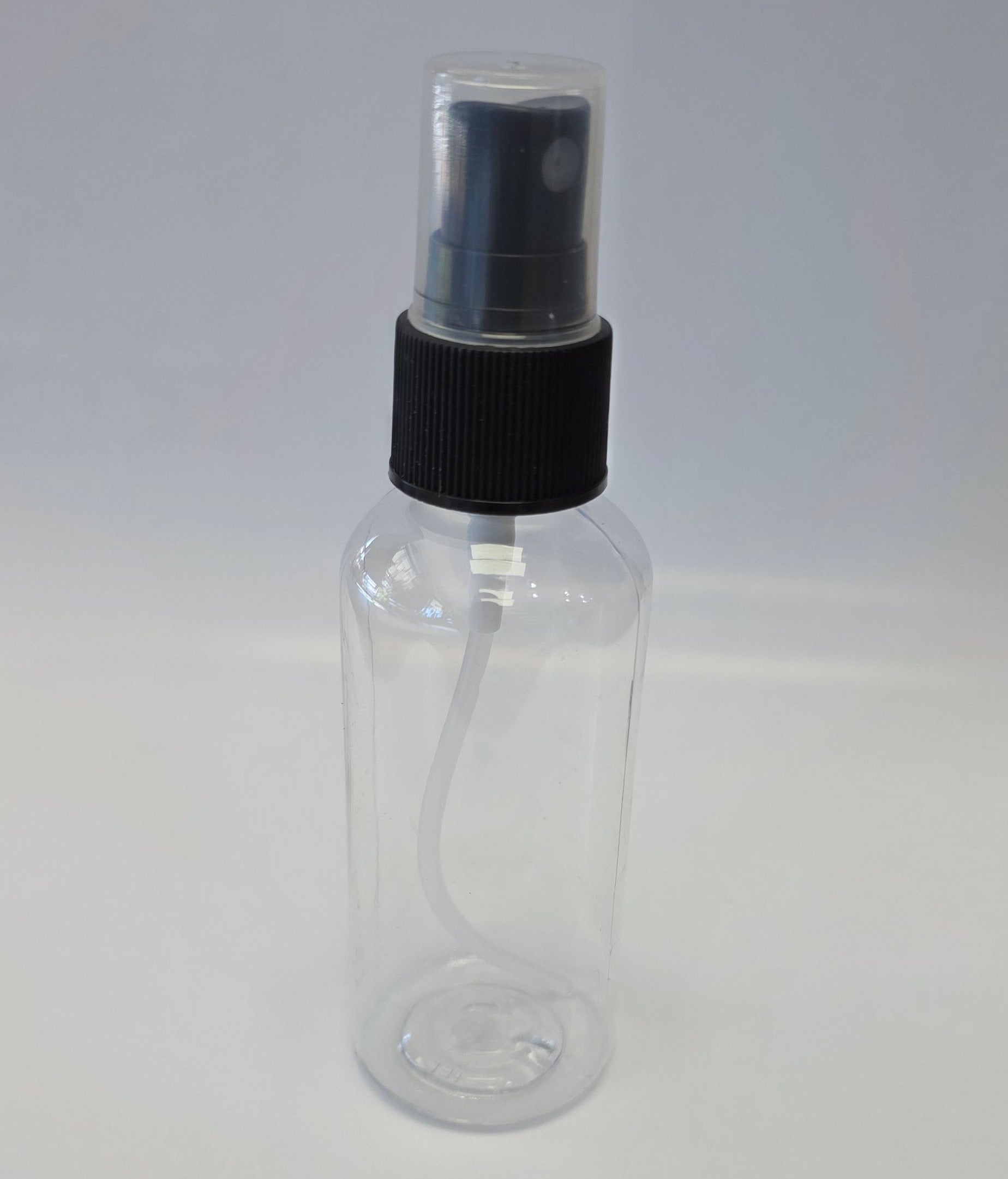 Clear plastic bottle with black cap on a white background